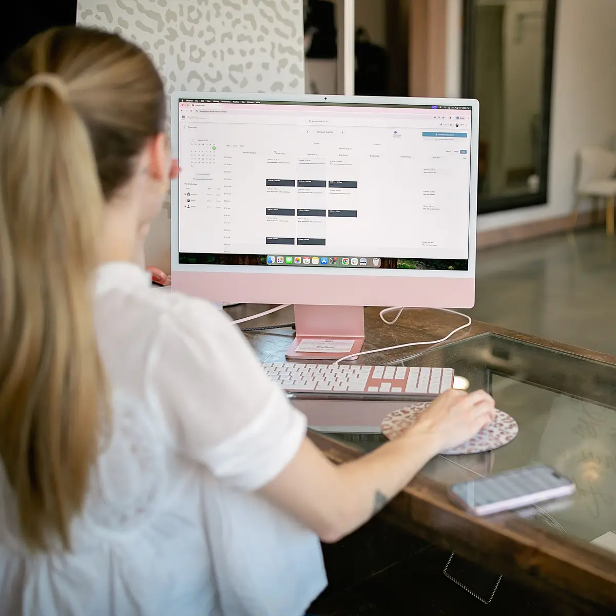 Woman on a laptop working in Poppy